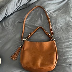 Brown crossover shoulder handbag